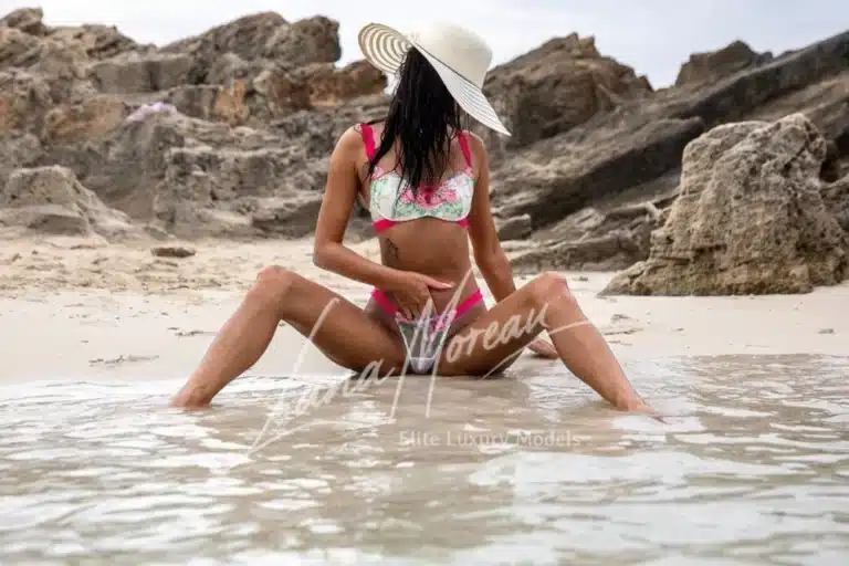 Bold beach shot in floral set – VIP Escort Munich