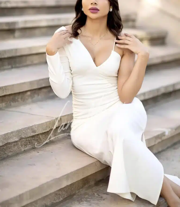 Glamorous woman in white gown