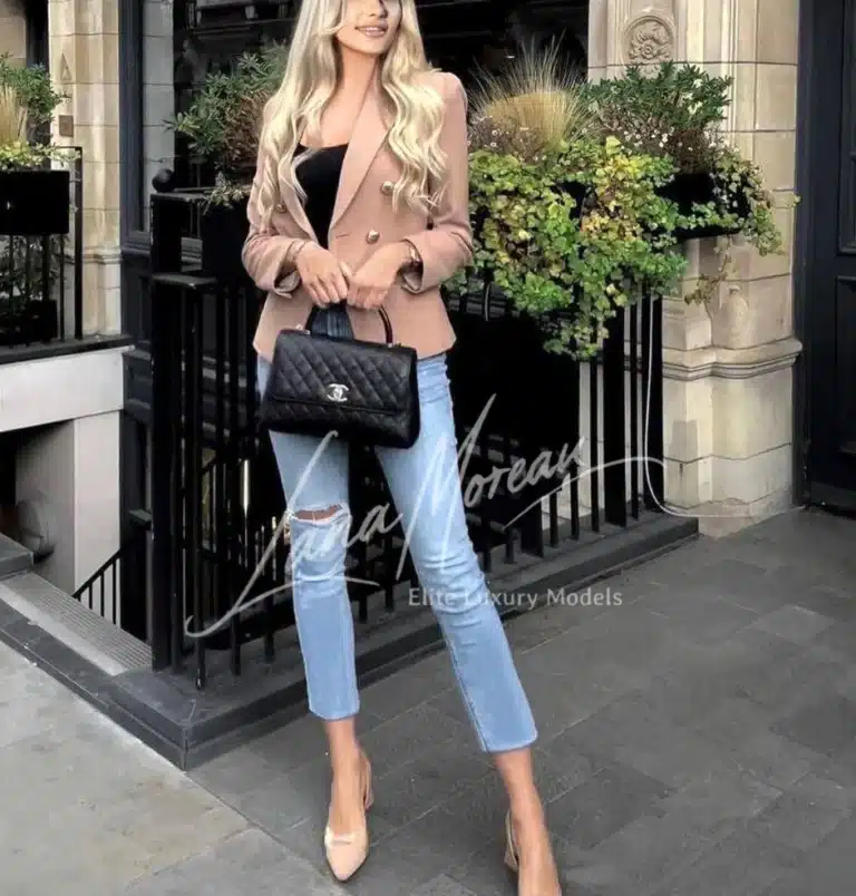 Elegant blonde escort dubai in city style