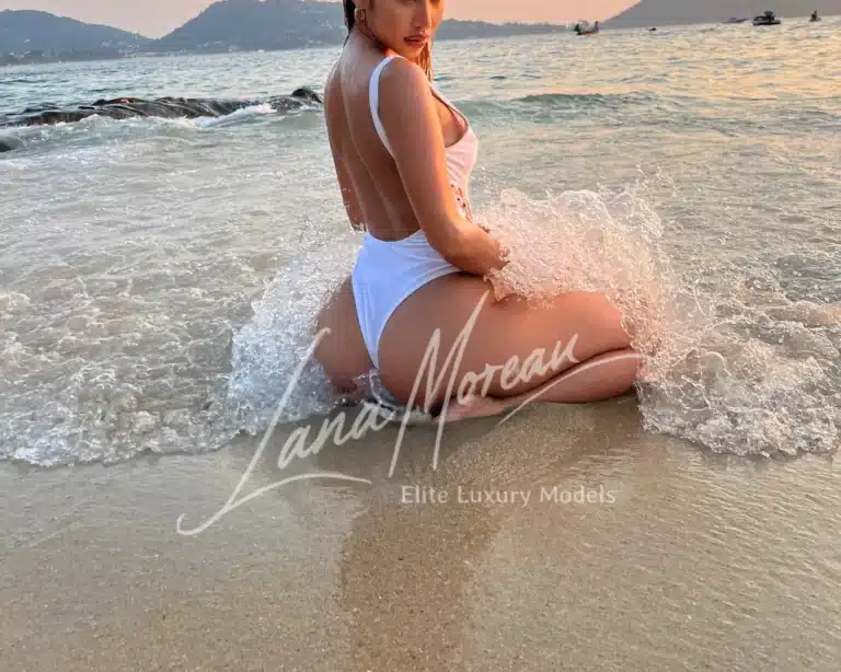 Elite companion Emma in white bikini