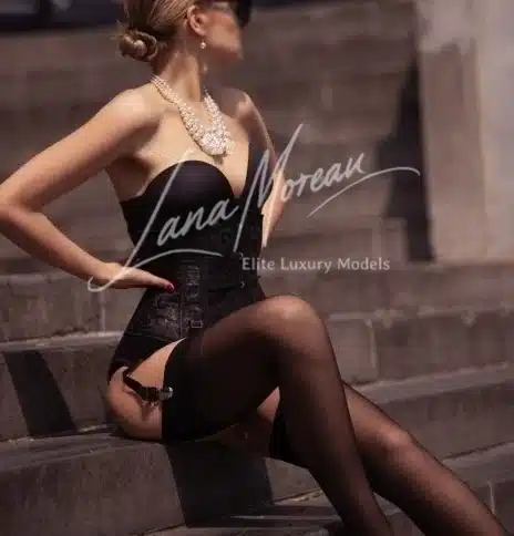 High class lingerie model with pearls on stairs – elite escort in Brussels