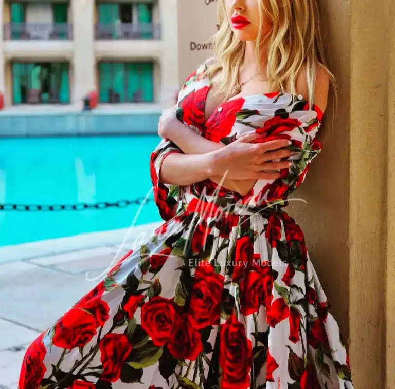 VIP escort in a floral dress