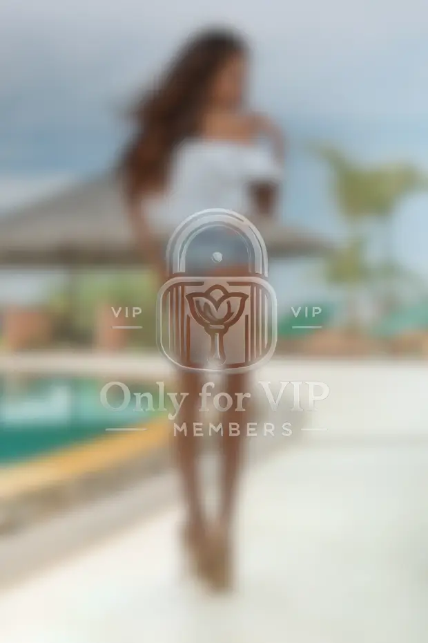 Kira, elite companion by poolside