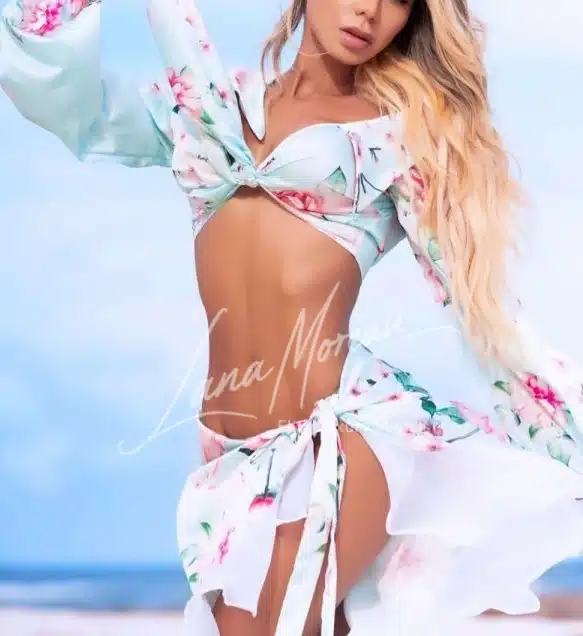 Luxury escort Alma in floral dress