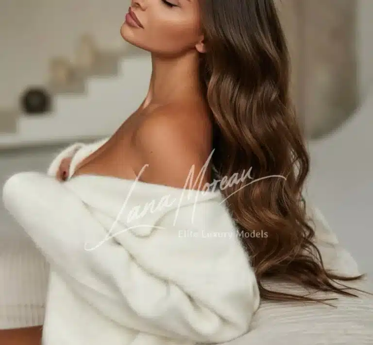 Alena in soft white knit, exuding warmth and sensuality